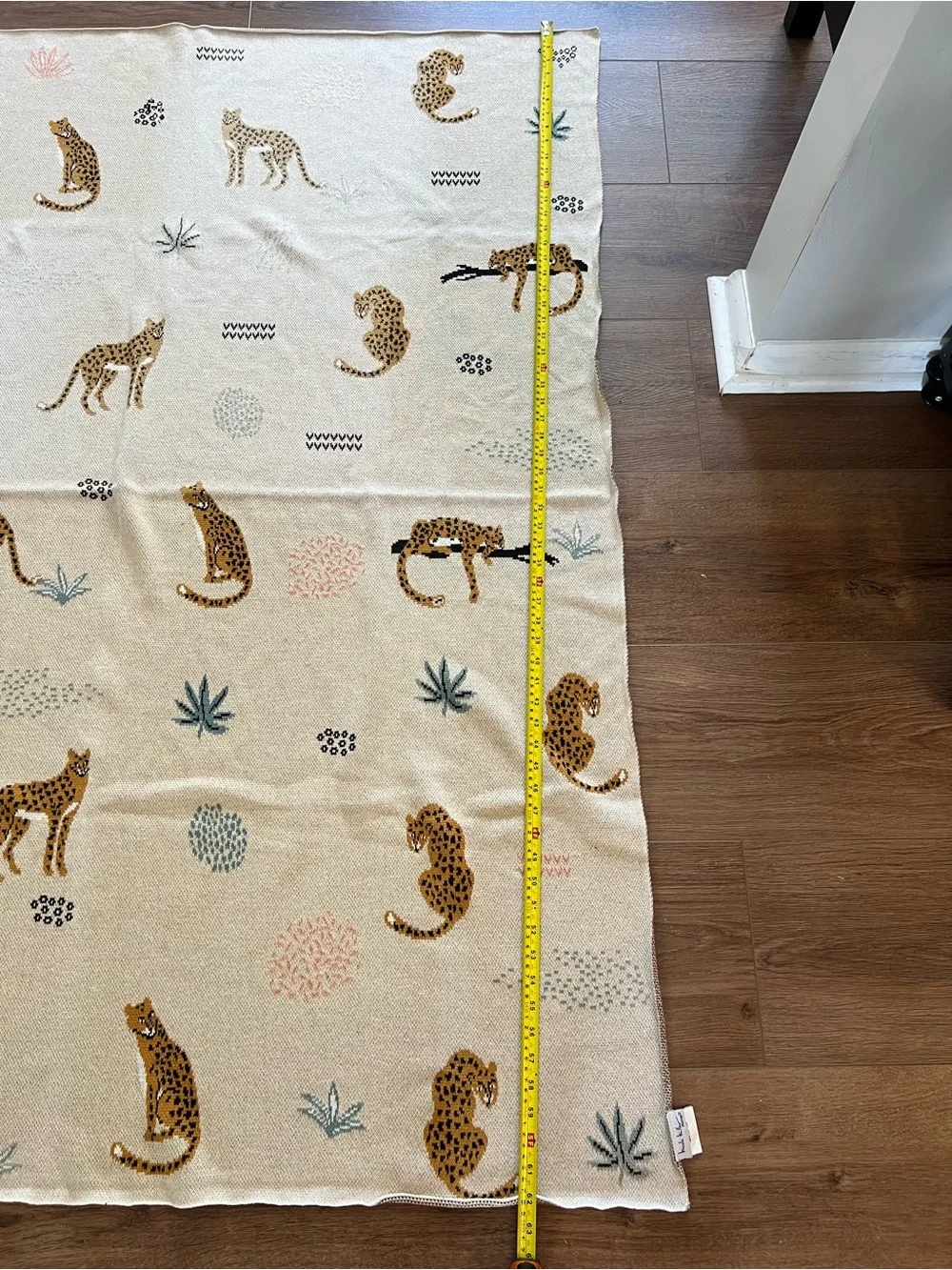 Nicole Miller Cream Throw Blanket with Gold Leopard Motif